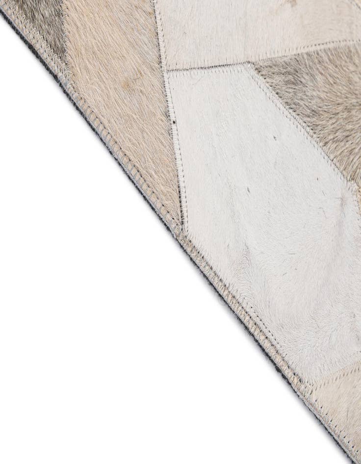 Detail image of  5' 1 x 7' 11 Cowhide - Patchwork Rug