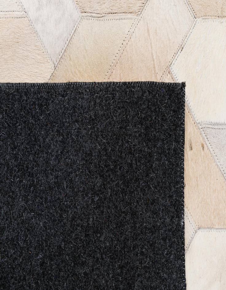 Detail image of  5' 1 x 7' 11 Cowhide - Patchwork Rug
