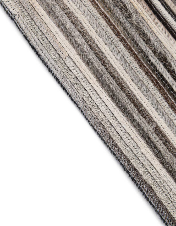 Detail image of  5' 2 x 8' Cowhide - Patchwork Rug