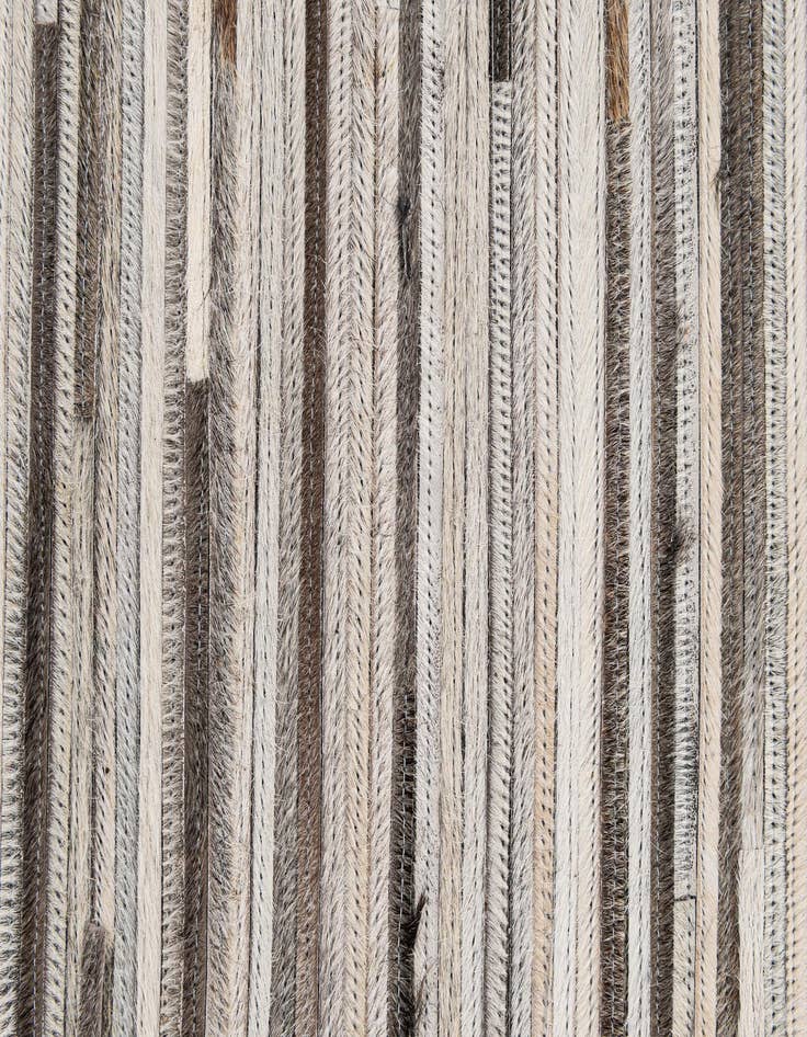 Detail image of  5' 2 x 8' Cowhide - Patchwork Rug