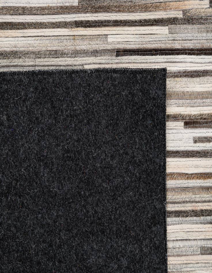 Detail image of  5' 2 x 8' Cowhide - Patchwork Rug