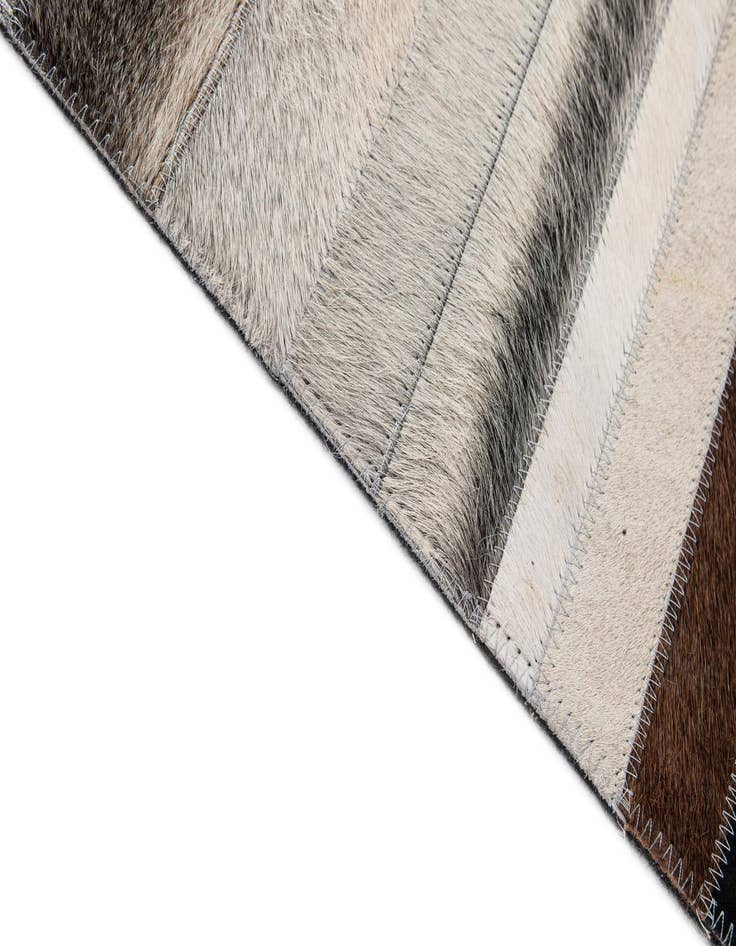 Detail image of  5' 1 x 8' 1 Cowhide - Patchwork Rug