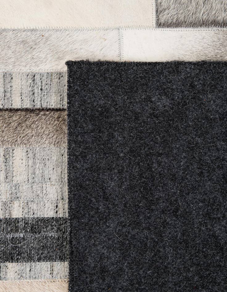 Detail image of  5' 1 x 8' 1 Cowhide - Patchwork Rug