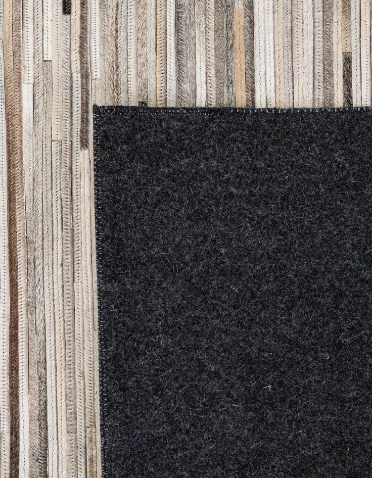 Detail image of  5' 1 x 8' 1 Cowhide - Patchwork Rug