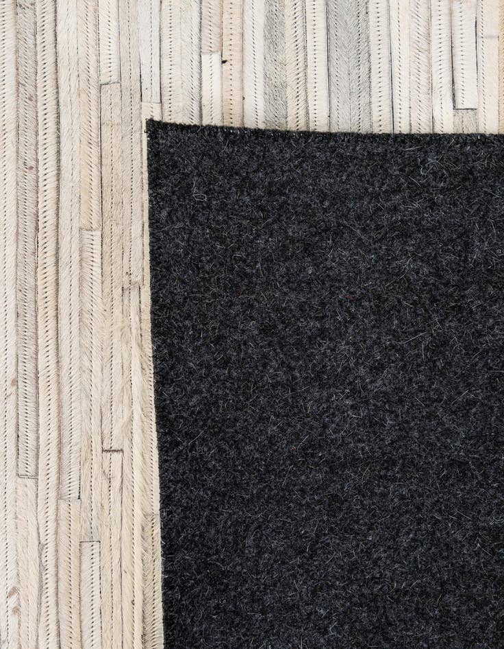 Detail image of  5' 1 x 8' Cowhide - Patchwork Rug