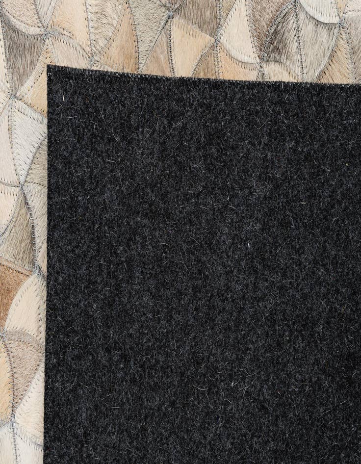 Detail image of  4' 11 x 7' 11 Cowhide - Patchwork Rug