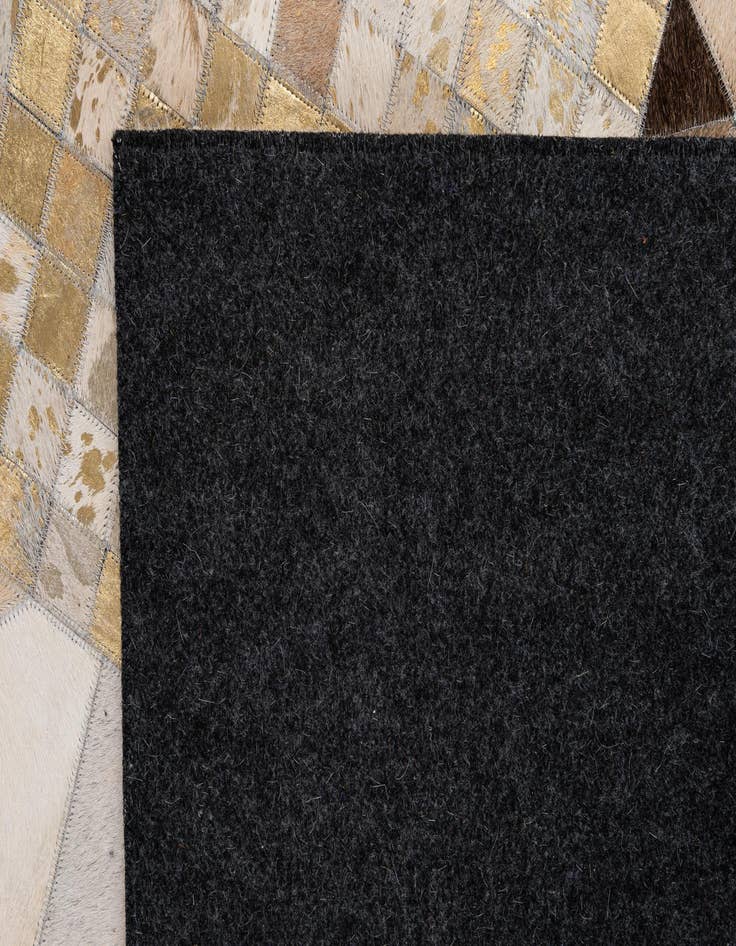 Detail image of  5' 2 x 8' Cowhide - Patchwork Rug