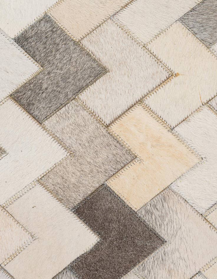 Detail image of  5' 2 x 8' Cowhide - Patchwork Rug