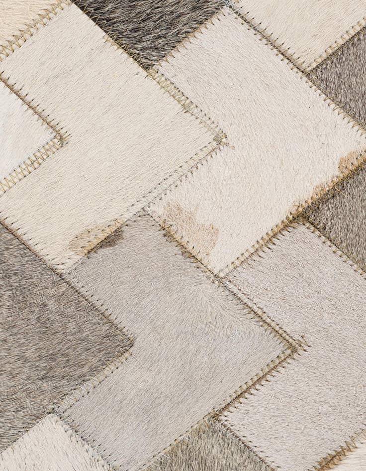 Detail image of  5' 2 x 8' Cowhide - Patchwork Rug