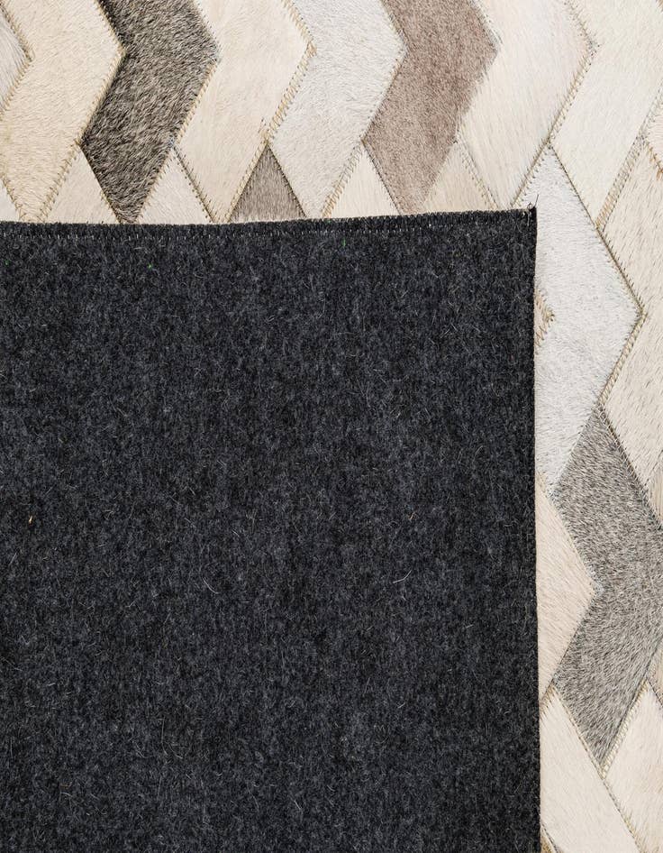 Detail image of  5' 2 x 8' Cowhide - Patchwork Rug