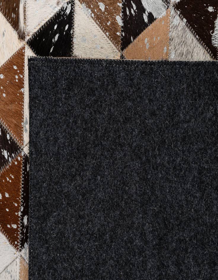 Detail image of  4' 11 x 8' Cowhide - Patchwork Rug