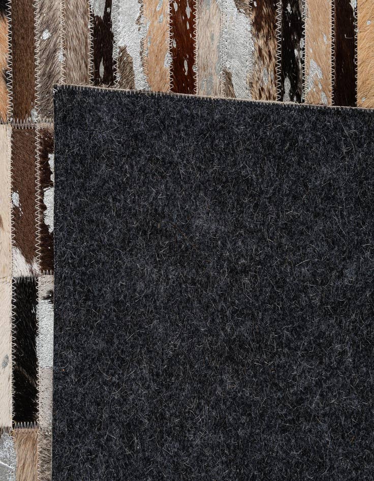 Detail image of  5' x 7' 11 Cowhide - Patchwork Rug