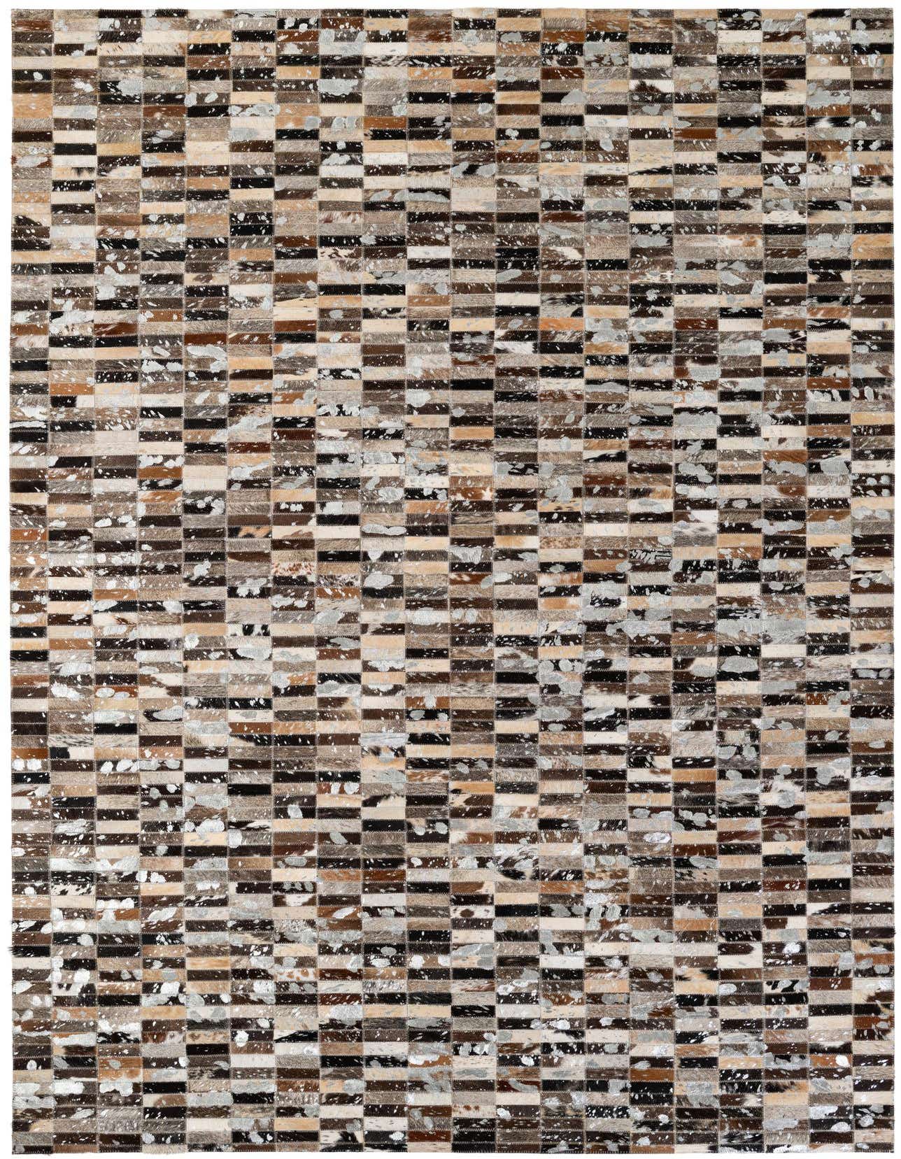 A rectangular 5x8 multi-colored patchwork cowhide rug with a modern stripe pattern, ideal for a living room.