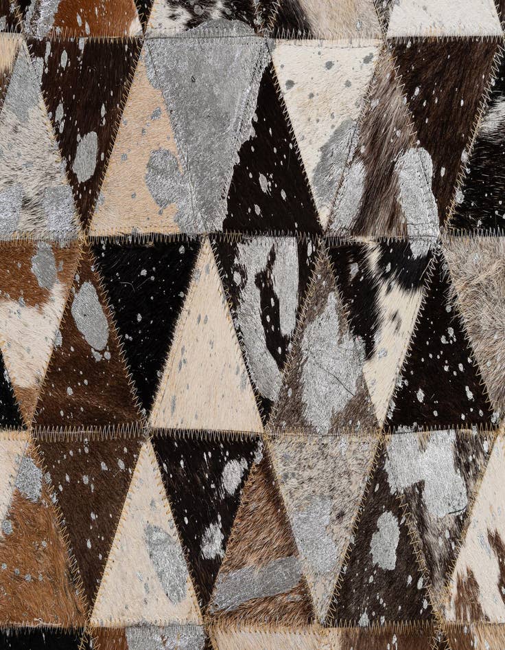 Detail image of  4' 11 x 8' Cowhide - Patchwork Rug