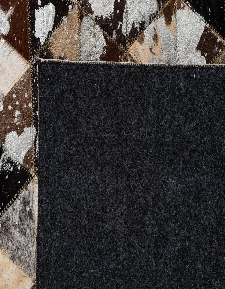 Detail image of  4' 11 x 8' Cowhide - Patchwork Rug