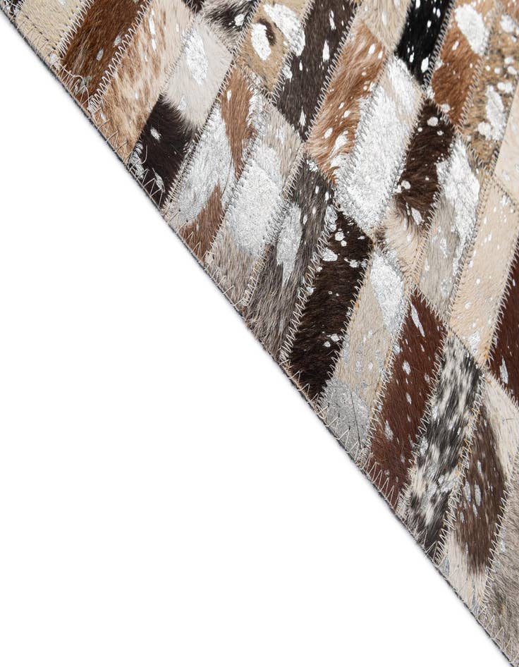 Detail image of  5' x 7' 11 Cowhide - Patchwork Rug