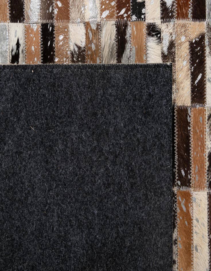 Detail image of  5' x 7' 11 Cowhide - Patchwork Rug