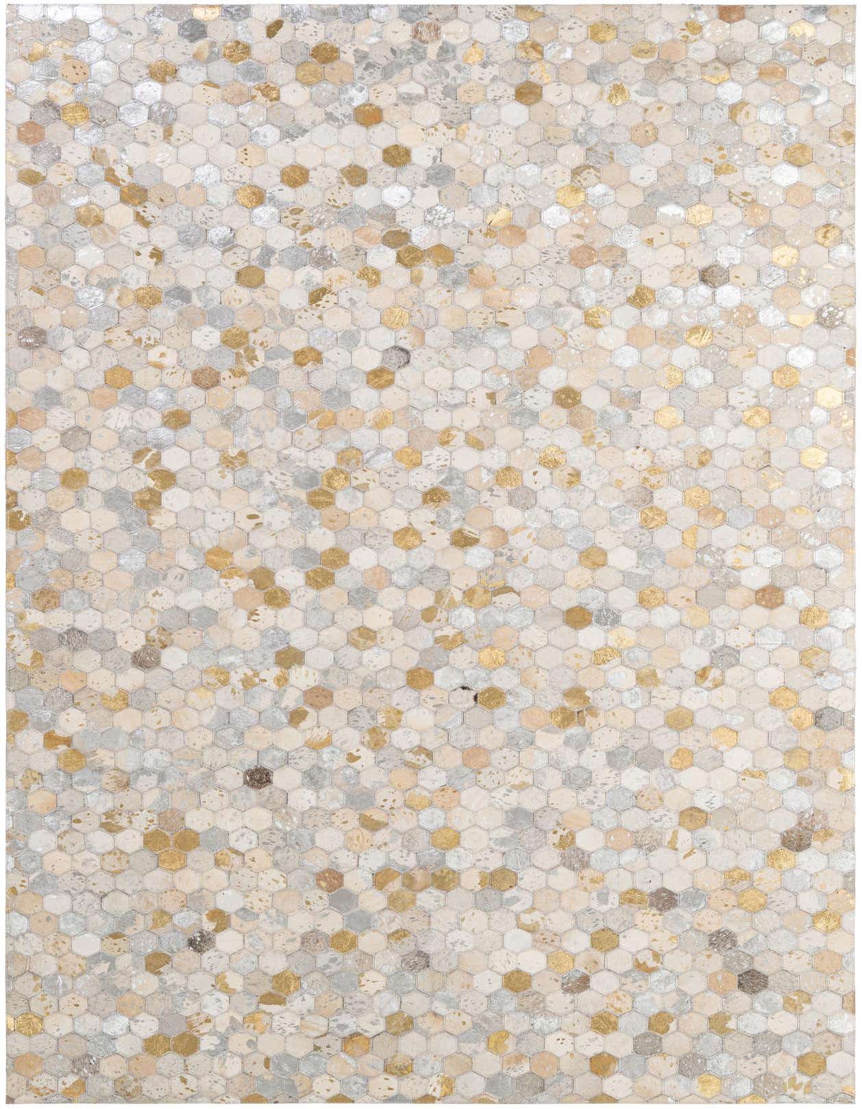 A rectangular 5x8 modern patchwork cowhide rug featuring a mosaic of multi-colored hexagonal pieces with metallic gold and silver accents.