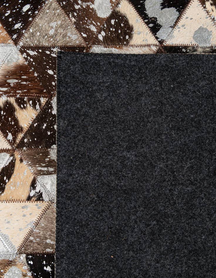 Detail image of  5' 1 x 7' 9 Cowhide - Patchwork Rug