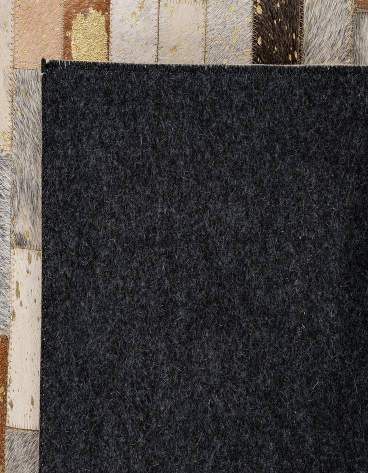 Detail image of  5' x 7' 11 Cowhide - Patchwork Rug