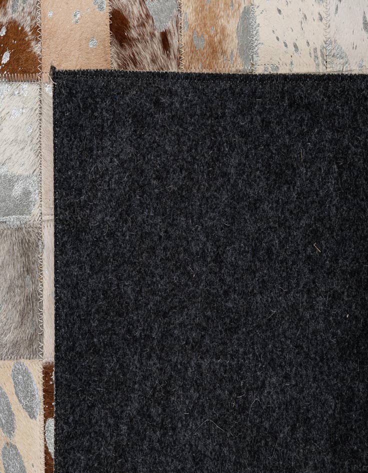 Detail image of  5' 2 x 8' Cowhide - Patchwork Rug