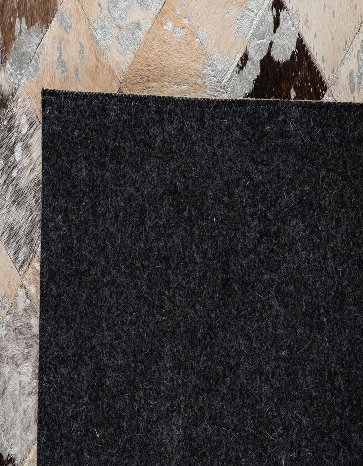 Detail image of  5' 1 x 8' Cowhide - Patchwork Rug