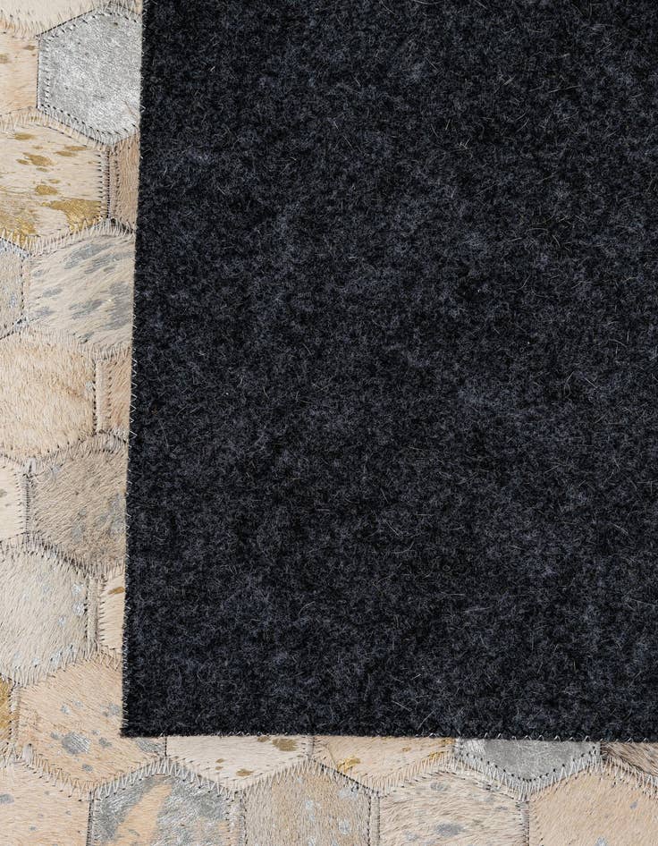 Detail image of  5' 1 x 7' 10 Cowhide - Patchwork Rug