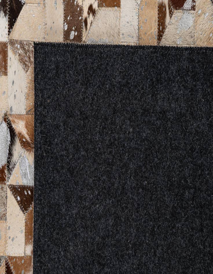 Detail image of  5' 1 x 8' Cowhide - Patchwork Rug