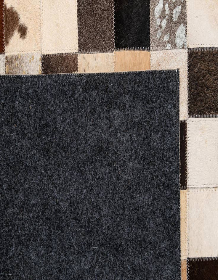 Detail image of  5' 1 x 8' Cowhide - Patchwork Rug