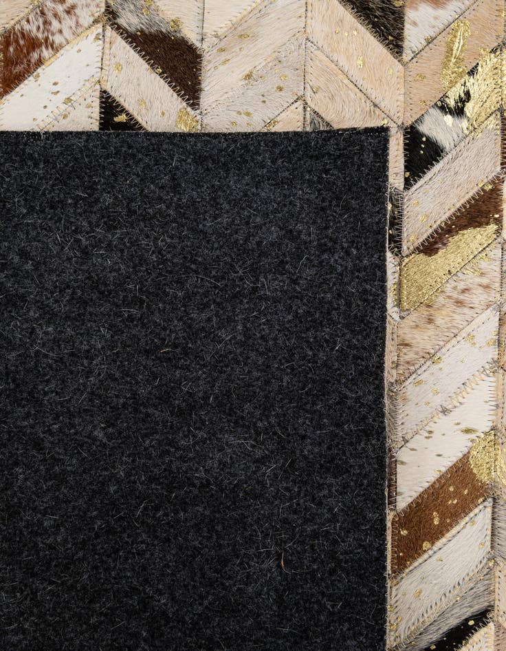 Detail image of  5' 2 x 8' Cowhide - Patchwork Rug