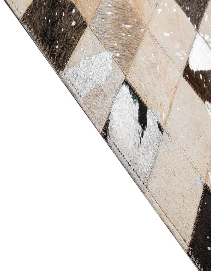 Detail image of  5' x 7' 11 Cowhide - Patchwork Rug