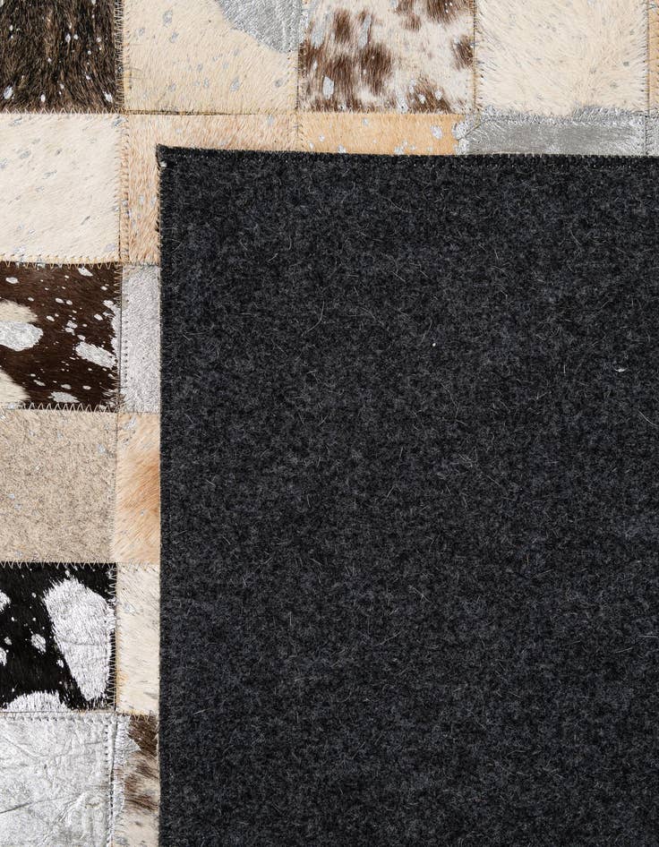 Detail image of  5' x 7' 11 Cowhide - Patchwork Rug