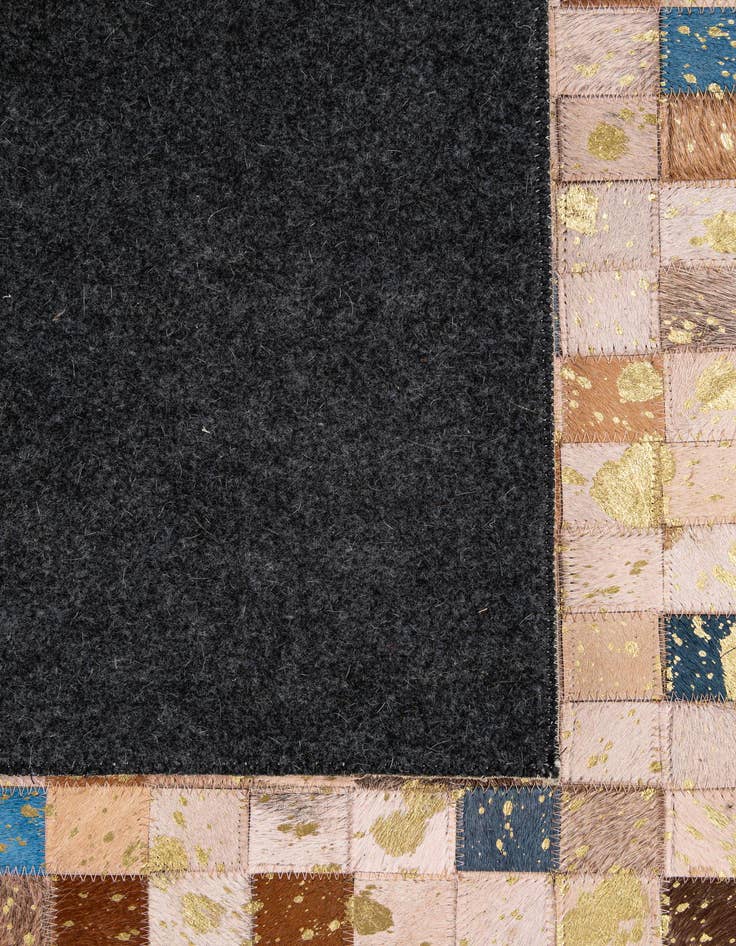 Detail image of  5' 1 x 7' 11 Cowhide - Patchwork Rug