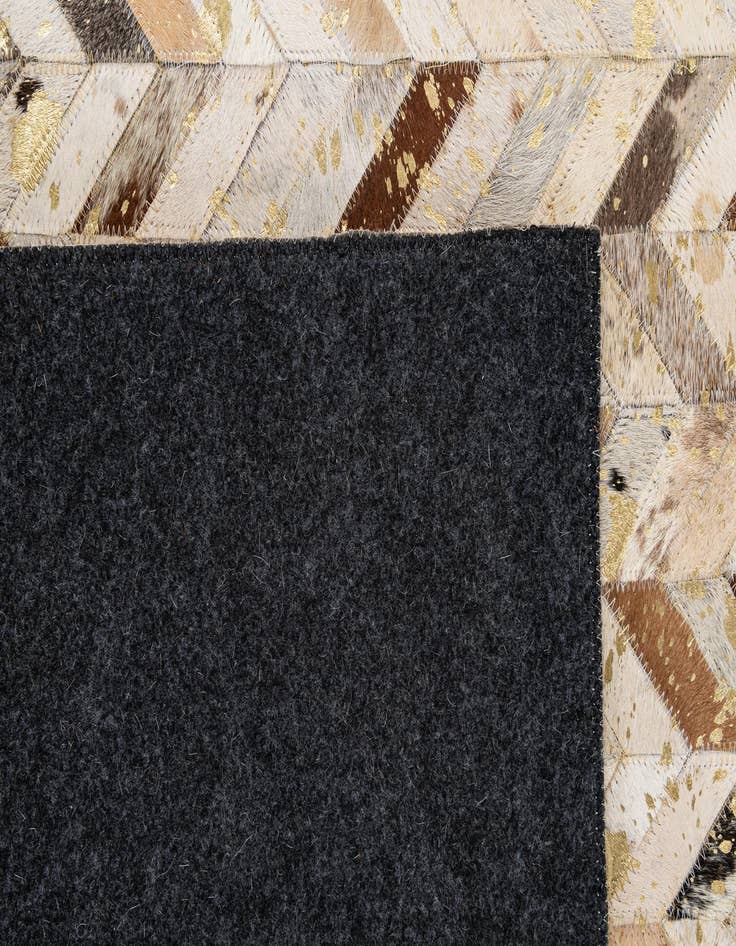 Detail image of  5' 2 x 7' 11 Cowhide - Patchwork Rug