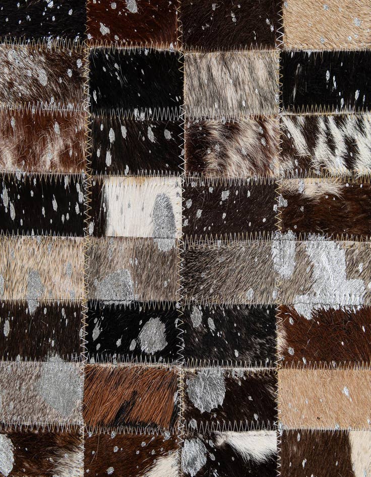 Detail image of  5' 2 x 7' 11 Cowhide - Patchwork Rug