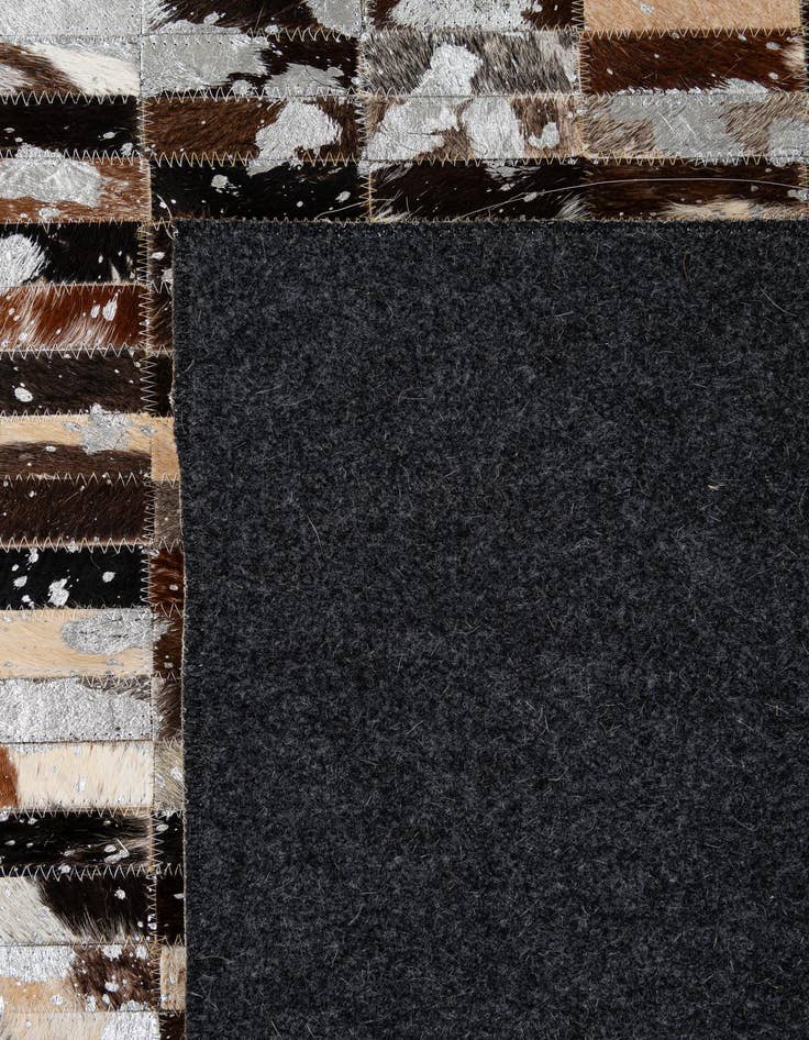 Detail image of  5' 2 x 7' 11 Cowhide - Patchwork Rug