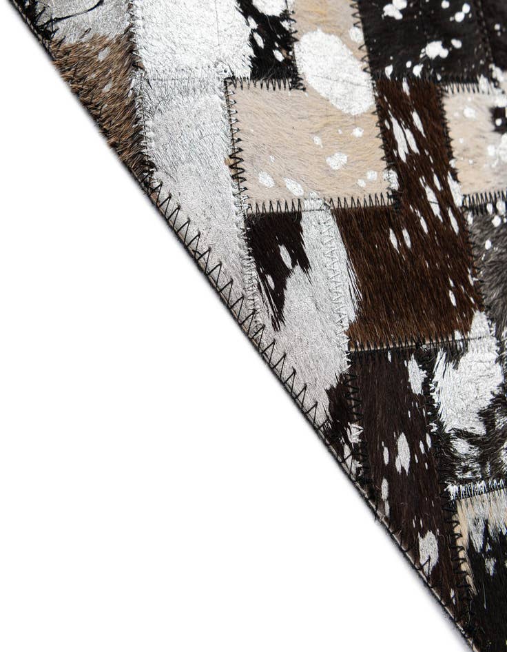 Detail image of  5' x 7' 11 Cowhide - Patchwork Rug