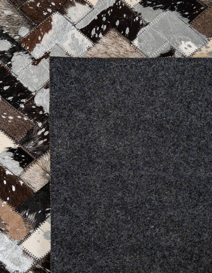 Detail image of  5' x 7' 11 Cowhide - Patchwork Rug