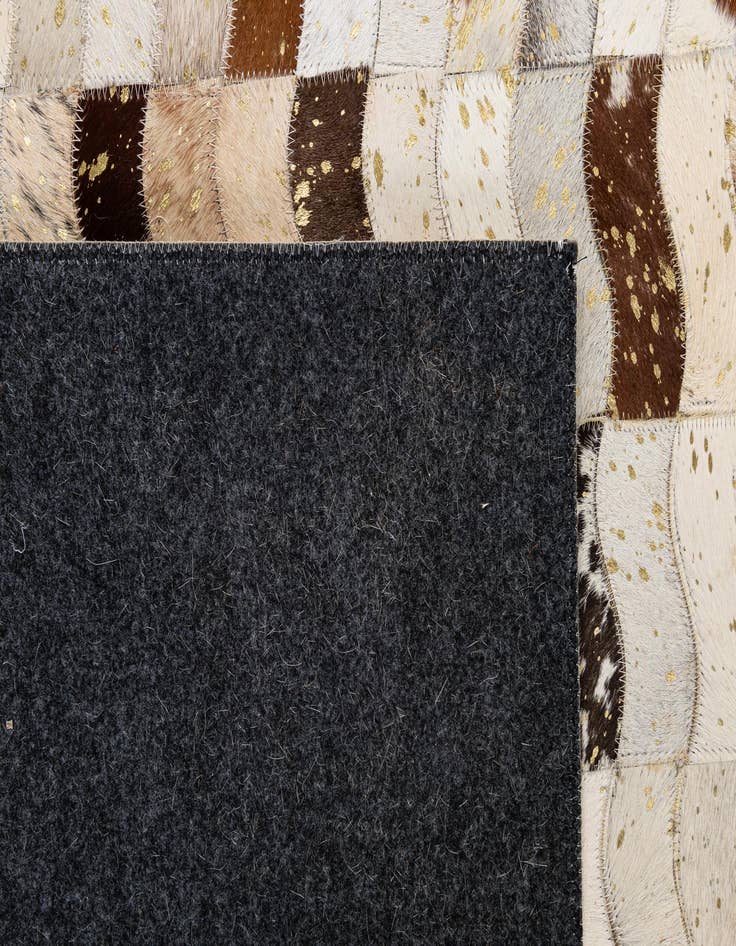Detail image of  5' 1 x 7' 11 Cowhide - Patchwork Rug