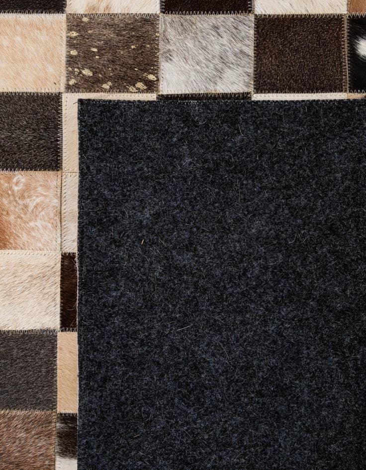 Detail image of  5' 1 x 8' Cowhide - Patchwork Rug