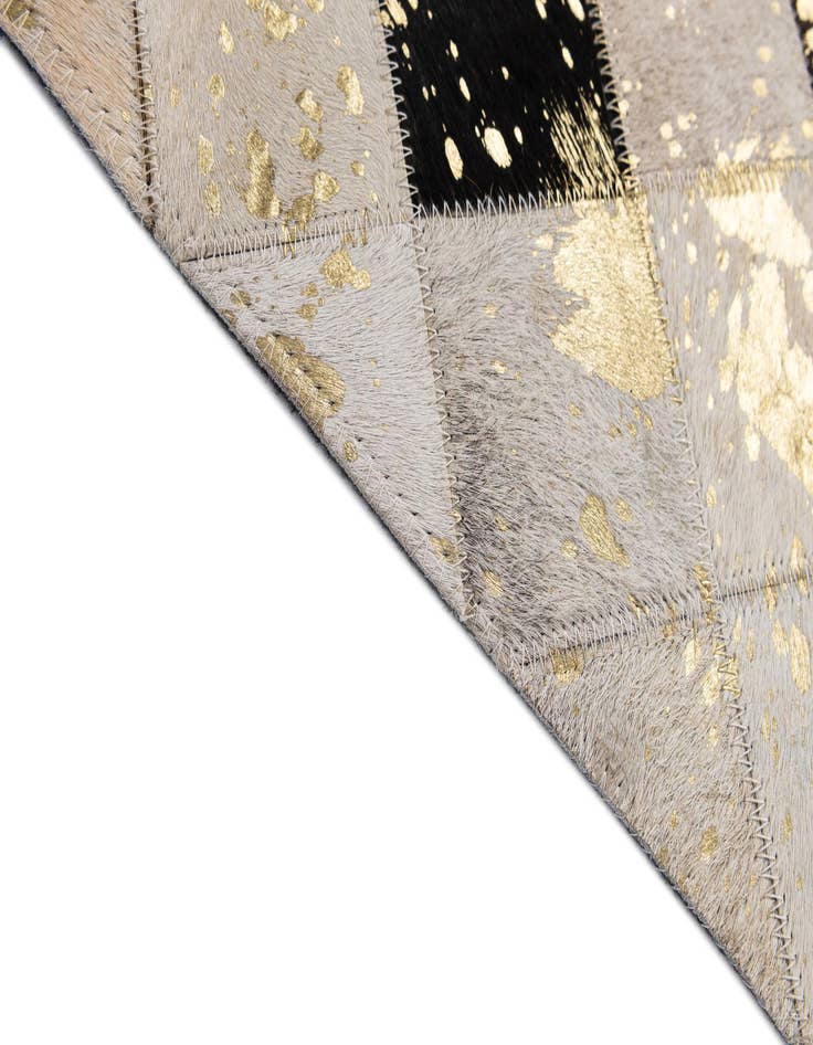 Detail image of  5' 1 x 7' 9 Cowhide - Patchwork Rug