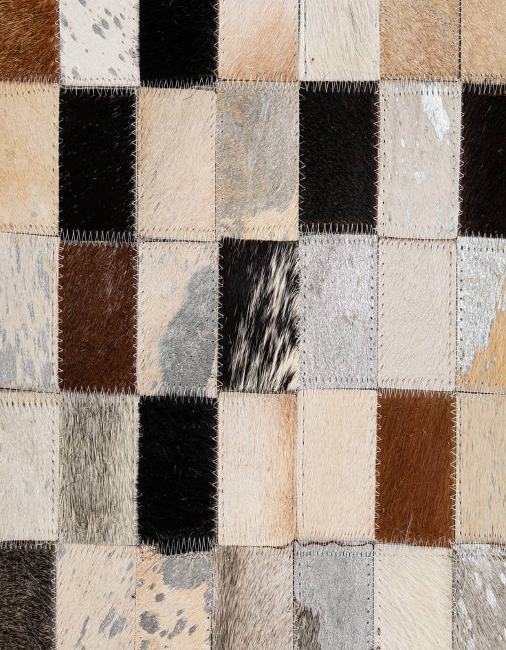 Detail image of  5' 1 x 7' 11 Cowhide - Patchwork Rug