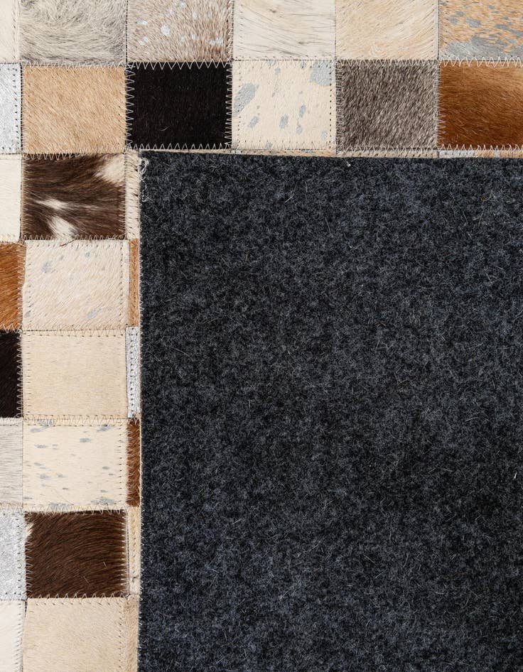 Detail image of  5' 1 x 7' 11 Cowhide - Patchwork Rug