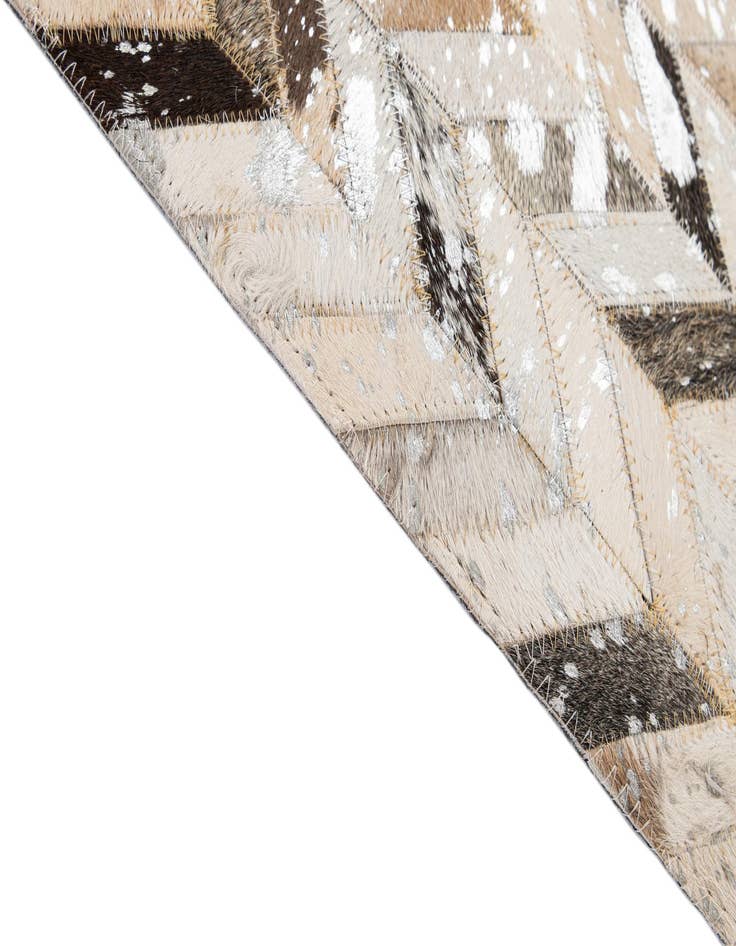 Detail image of  5' 2 x 8' Cowhide - Patchwork Rug