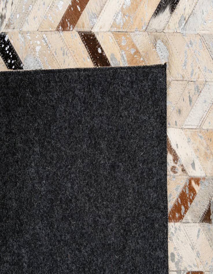 Detail image of  5' 2 x 8' Cowhide - Patchwork Rug