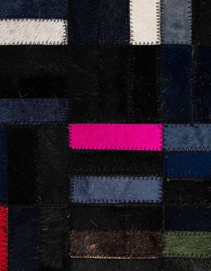 Detail image of  5' 1 x 7' 11 Cowhide - Patchwork Rug