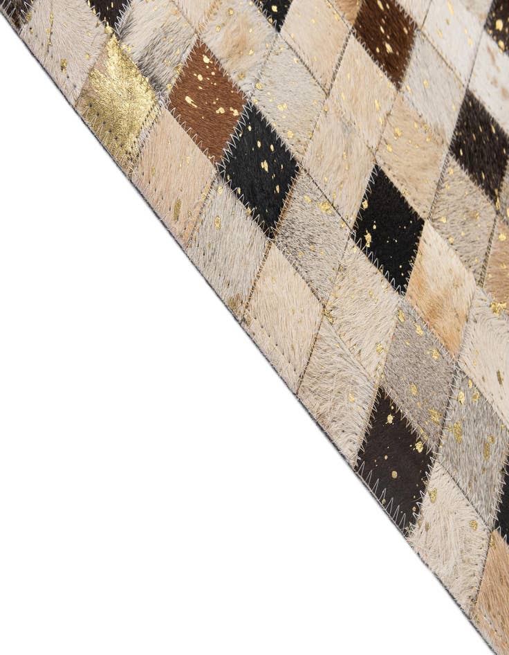 Detail image of  5' 2 x 7' 11 Cowhide - Patchwork Rug
