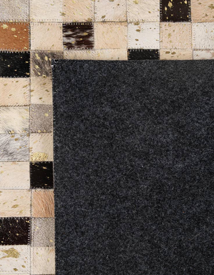 Detail image of  5' 2 x 7' 11 Cowhide - Patchwork Rug