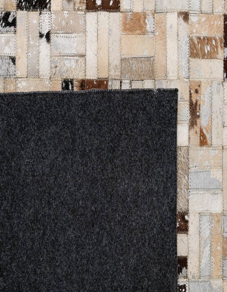 Detail image of  5' x 7' 11 Cowhide - Patchwork Rug