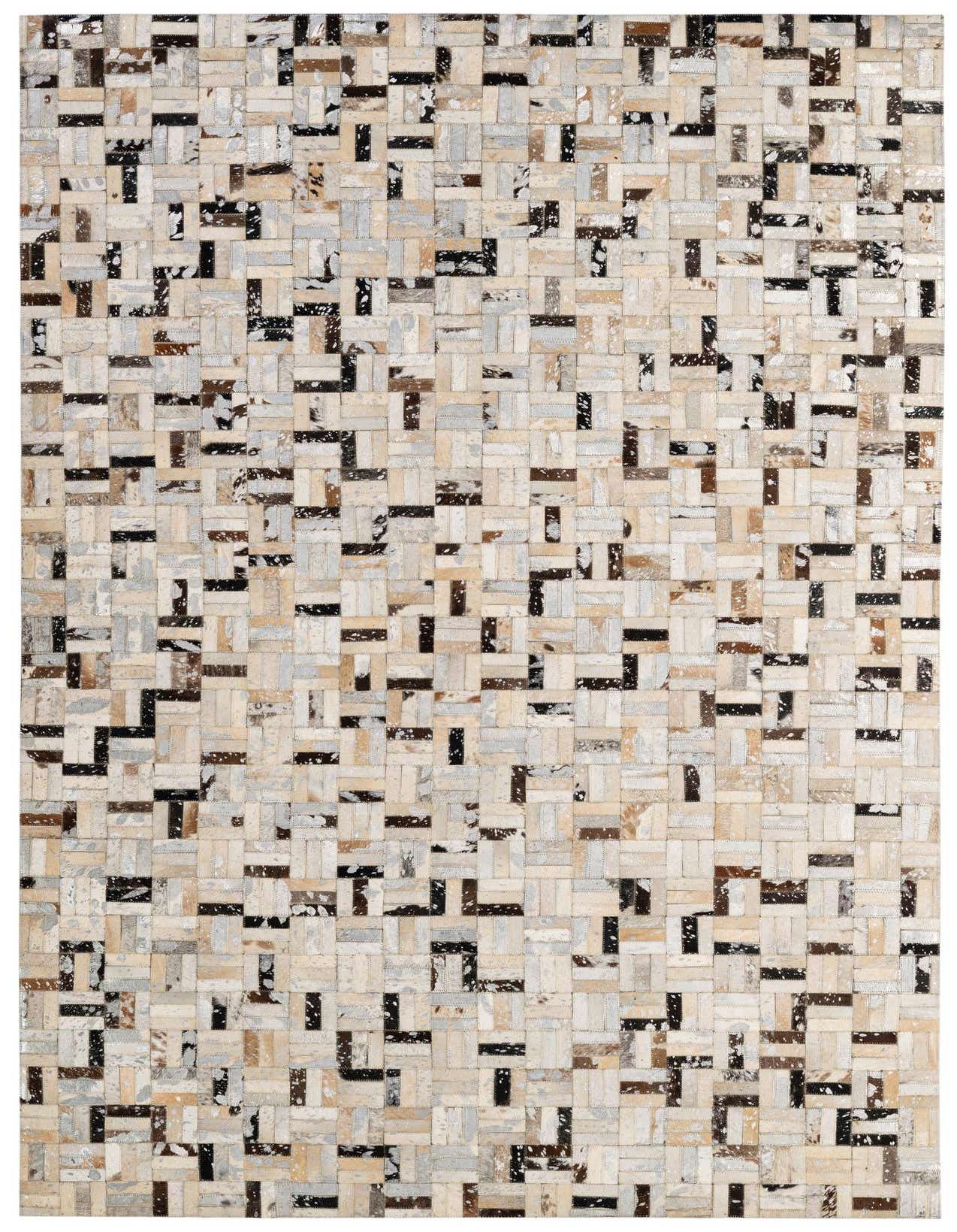 A 5x8 rectangular Cowhide Patchwork rug featuring a modern stripe pattern in multi-colored natural cowhide and leather.